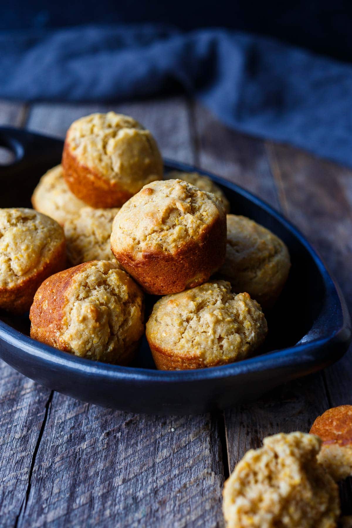 vegan cornbread muffins in serving dish.