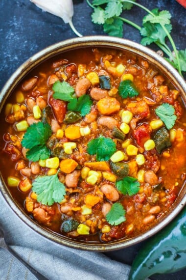 Wholesome, hearty and flavorful this Pinto Bean Stew is quick to throw to together and perfect for fall and winter weeknight dinners.  Instant Pot or Stovetop version!