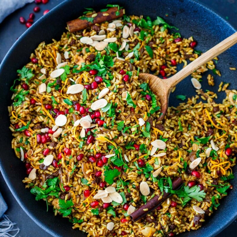 This Moroccan Rice recipe is a delicious, wholesome side dish for any occasion! Made with savory Moroccan spices, almonds, dried fruit, and orange zest.
