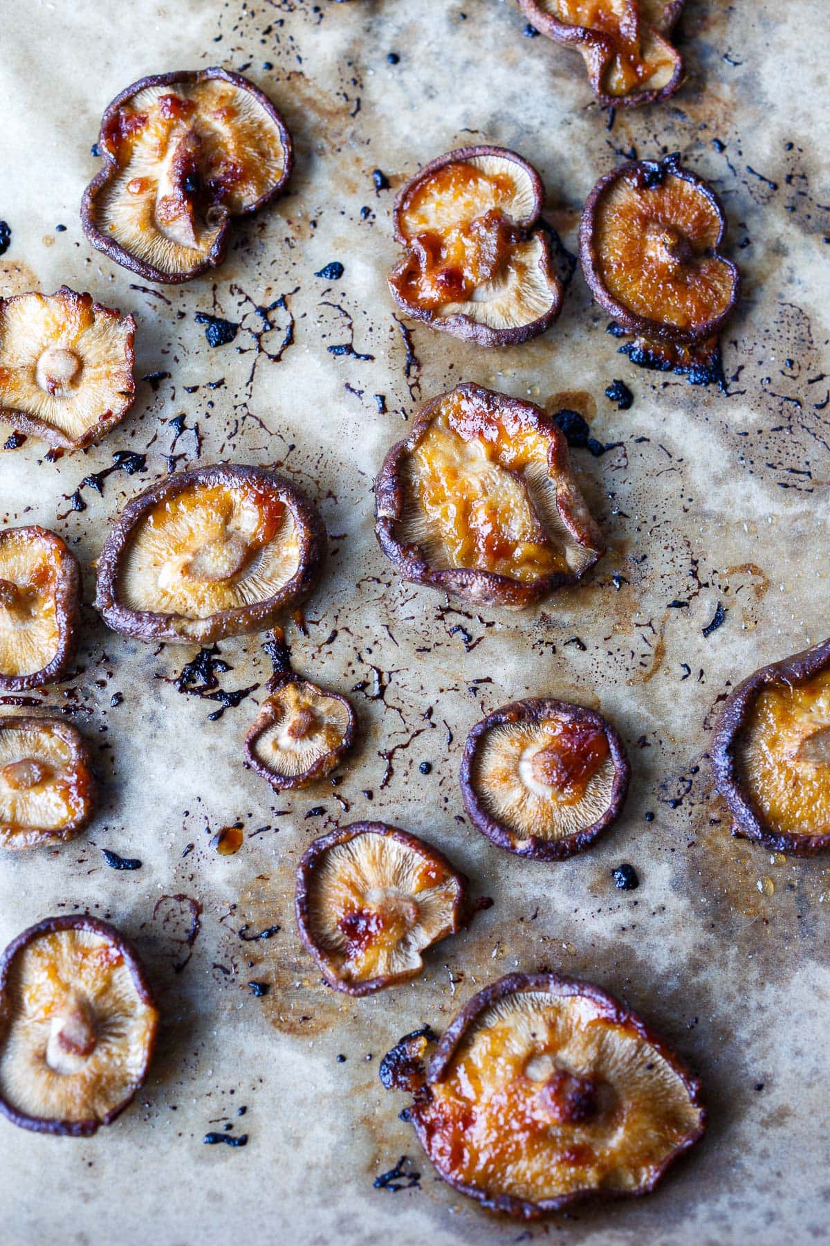 Shiitake mushrooms roasted on a baking sheet.