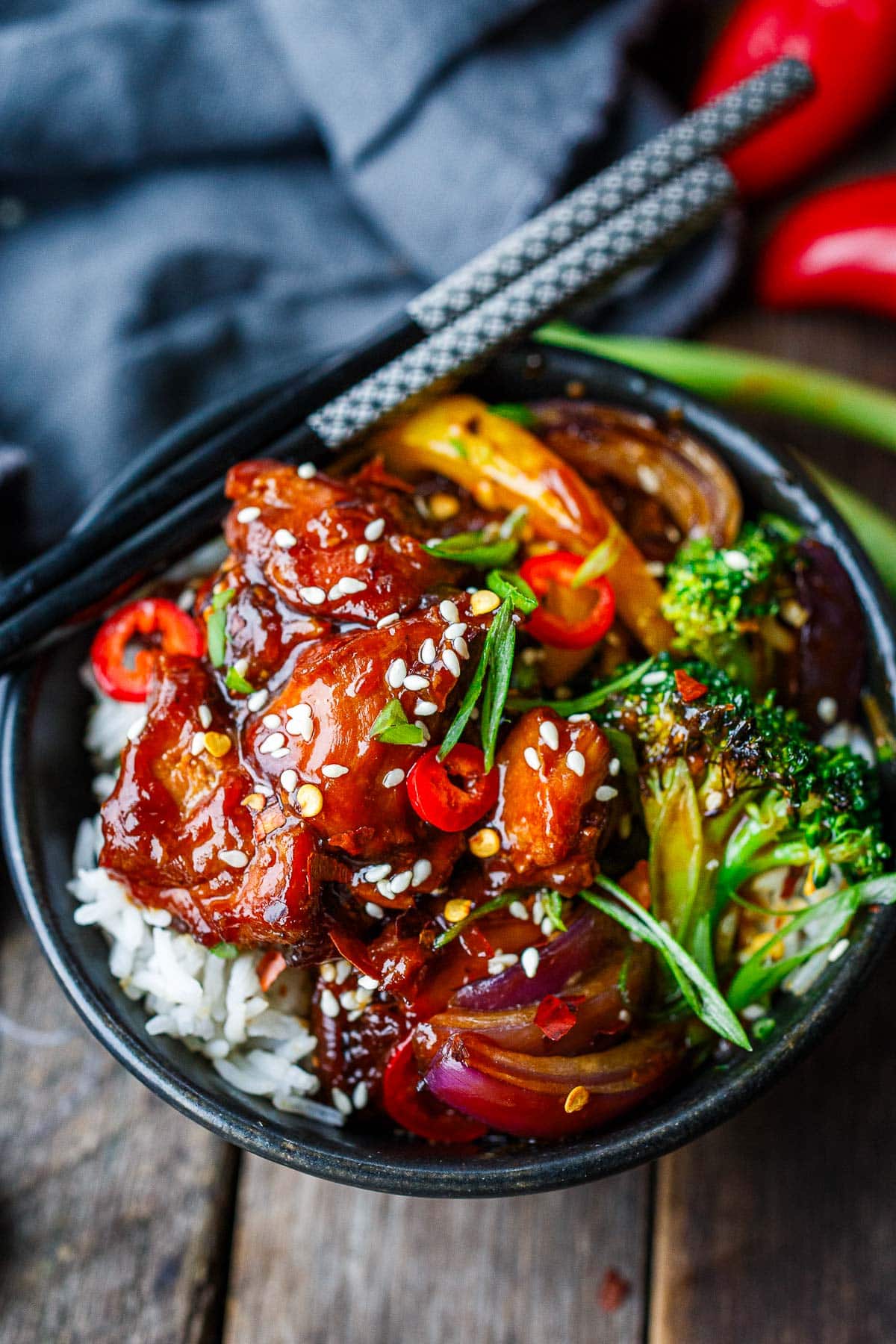 bowl with jasmine rice, cubed instant pot teriyaki chicken, broccoli and onions.