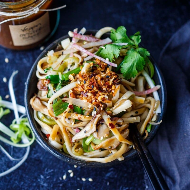 Filled with savory umami flavor, celebratory Longevity Noodles are seasoned with homemade Vegan oyster sauce and tossed with shiitake mushrooms, bok choy and scallions. Vegan. Gluten-free adaptable.