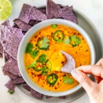 This creamy Vegan Queso recipe is so delicious! A highly adaptable recipe packed with wholesome veggies and perfect for nachos, burrito bowls, and tacos.