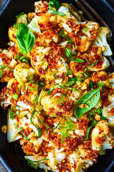 Golden and delicious roasted Chili Crisp Cauliflower is a fast and easy side dish or tasty appetizer with loads of flavor and crispy crunchy texture.