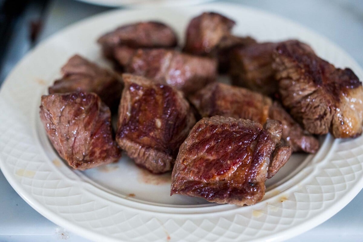 browned lamb on a plate.