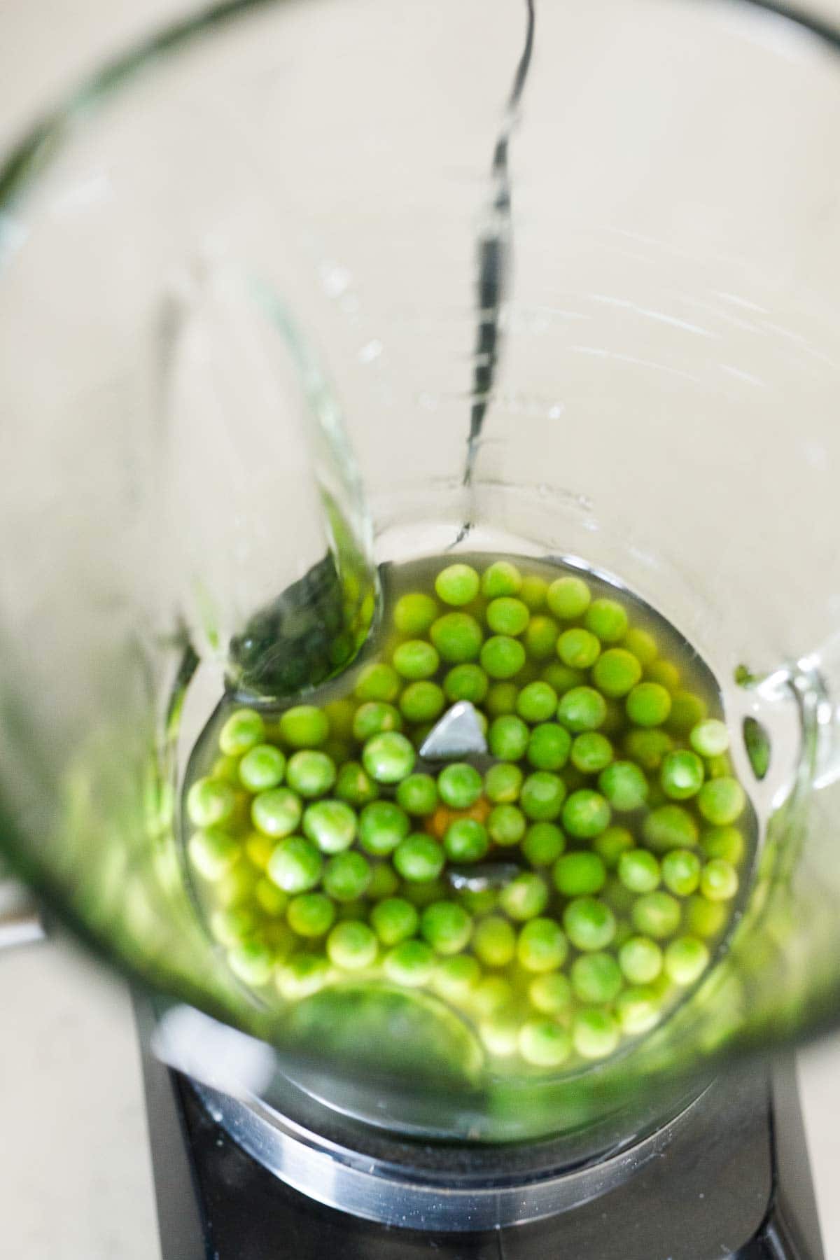 blanched peas in blender.