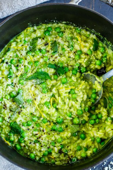 This spring pea risotto recipe is lemony and minty and easy to make in about 30 minutes. It's delicious topped with seared fish or scallops—or serve it on its own for a lovely vegetarian dinner!