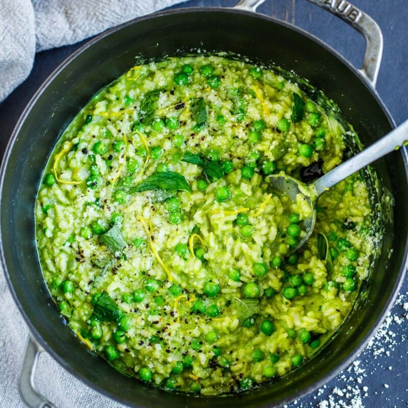 This spring pea risotto recipe is lemony and minty and easy to make in about 30 minutes. It's delicious topped with seared fish or scallops—or serve it on its own for a lovely vegetarian dinner!