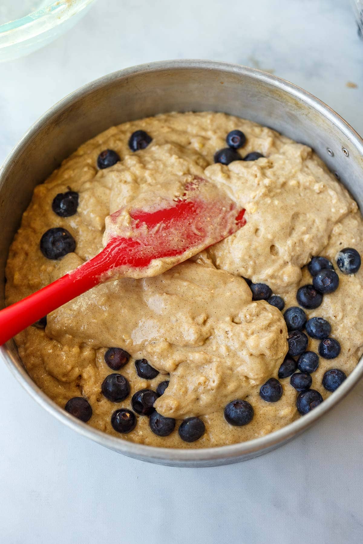 blueberry coffee batter in a baking dish. 