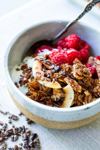 A polyphenol-rich Chocolate Granola recipe made w/ cacao nibs, cacao powder, GF oats, Ceylon cinnamon, maple syrup & olive oil. Vegan & easy.