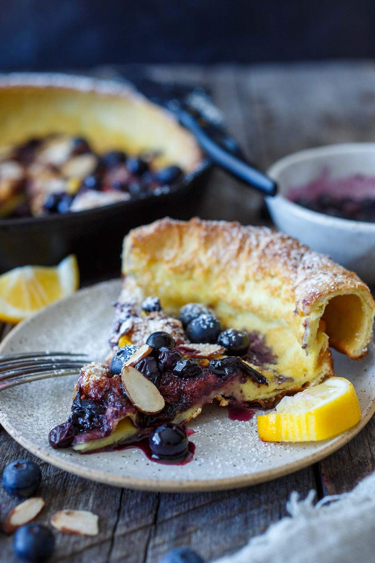 Delicious and impressive Blueberry Dutch Baby is made with everyday pantry ingredients and requires only about 10 minutes of hands-on time! Top with maple-sweetened blueberry sauce for a perfect brunch or dessert.