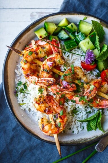 Tender mouthwatering Grilled Lemongrass Shrimp is easy and versatile. Serve with coconut rice, in lettuce wraps, or in a rice noodle bowl. Gluten-free.