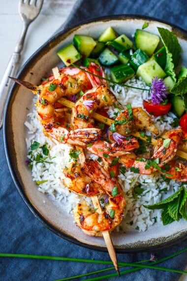 Tender mouthwatering Grilled Lemongrass Shrimp is easy and versatile. Serve with coconut rice, in lettuce wraps, or in a rice noodle bowl. Gluten-free.