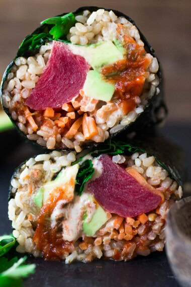 Delicious, easy Sushi Burritos! Sushi Rice, avocado, ahi, (or salmon or tofu) and veggies, wrapped up with Nori into a tasty healthy burrito!