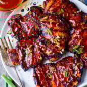 Succulent and bursting with flavor this Korean BBQ Chicken recipe is slathered with an easy homemade Korean BBQ sauce and grilled to perfection.