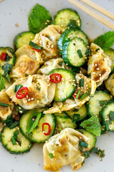 Wonton Salad recipe: Crispy wontons are tossed with crisp cucumbers, ginger, chilies, chives, garlic, and fresh mint in a simple Asian Dressing.