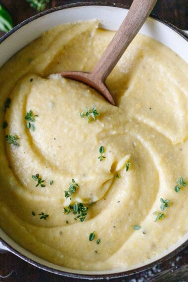 creamy polenta recipe in a white saucepan