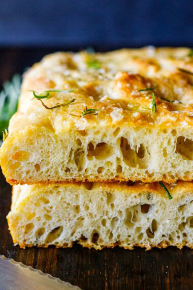 Hands down, this is the best focaccia bread recipe we've ever made! Topped with flaky sea salt and fresh rosemary, it's golden and airy with a crispy bottom. Easy to make. Vegan.