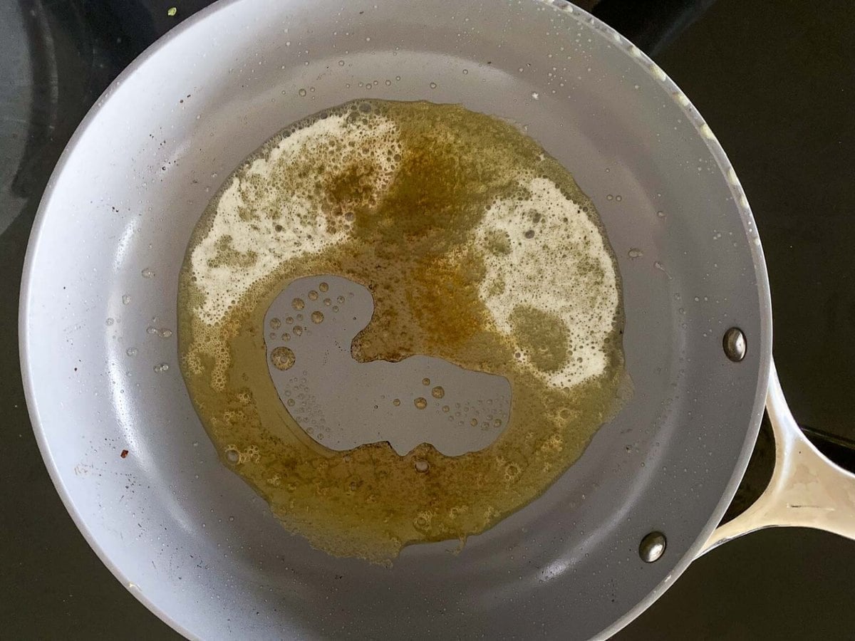 butter melting in skillet. 