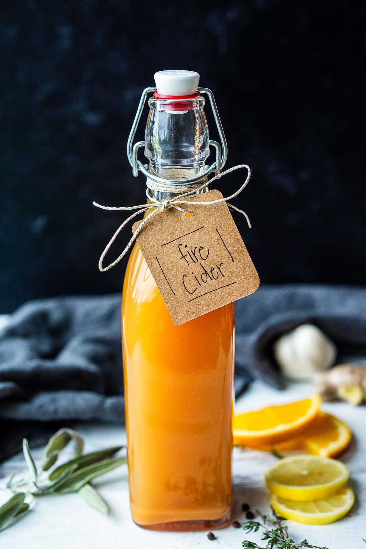 Boost your immunity with fire cider! A homemade health tonic made with apple cider vinegar, pungent roots, herbs and aromatics.