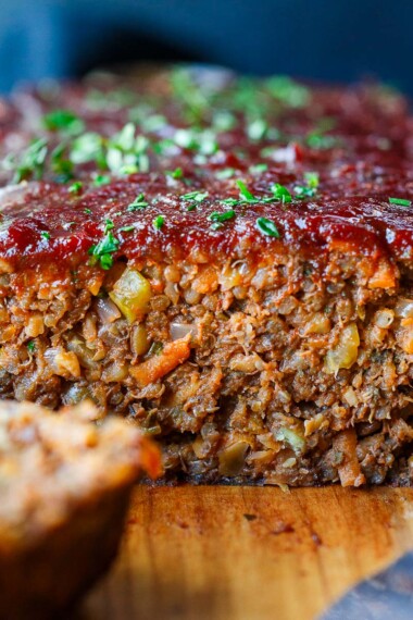This hearty Vegan Meatloaf is full of flavor and succulent texture. Lentils and quinoa pack it with plant protein, delivering a wholesome and satisfying meal. Gluten-free