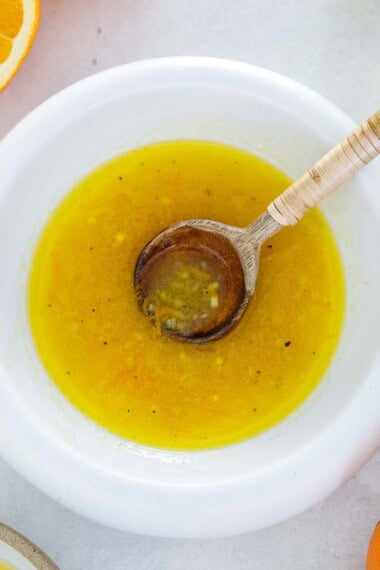 This citrus vinaigrette couldn't be any easier! Made with fresh orange juice, orange zest, shallot and EVOO, it is wonderfully bright and tangy with a hint of sweetness.