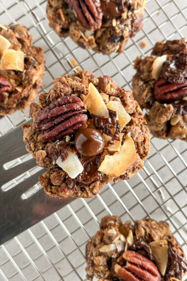 Full of texture and delicious flavor, Cowgirl Cookies are made with coconut, pecans, oats, dark chocolate, cinnamon and ginger. Gluten-free and vegan-adaptable.