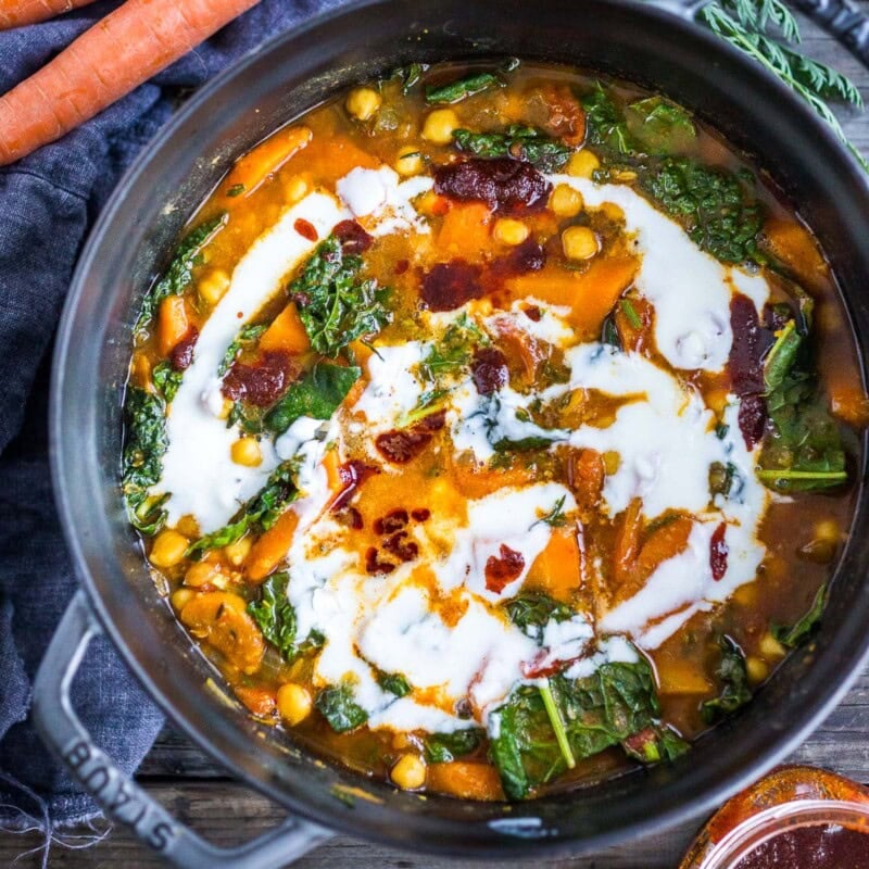 A simple, healthy Tunisian Chickpea Stew with carrots and their tops, kale and a "quick harissa" sauce- hearty and delicious, perfect for cozy nights. Gluten-free and vegan-adaptable. Video!