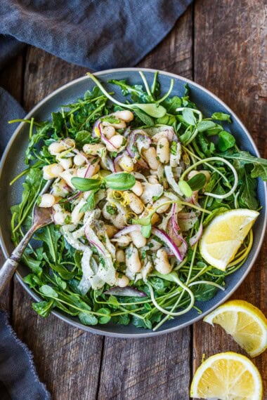 This simple white bean salad is easy to throw together, perfect for potlucks and gatherings or a quick, healthy meal! Vegan and gluten-free.