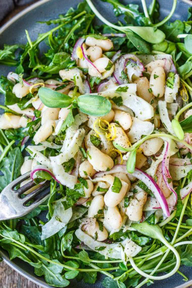 This simple white bean salad is easy to throw together, perfect for potlucks and gatherings or a quick, healthy meal! Vegan and gluten-free.