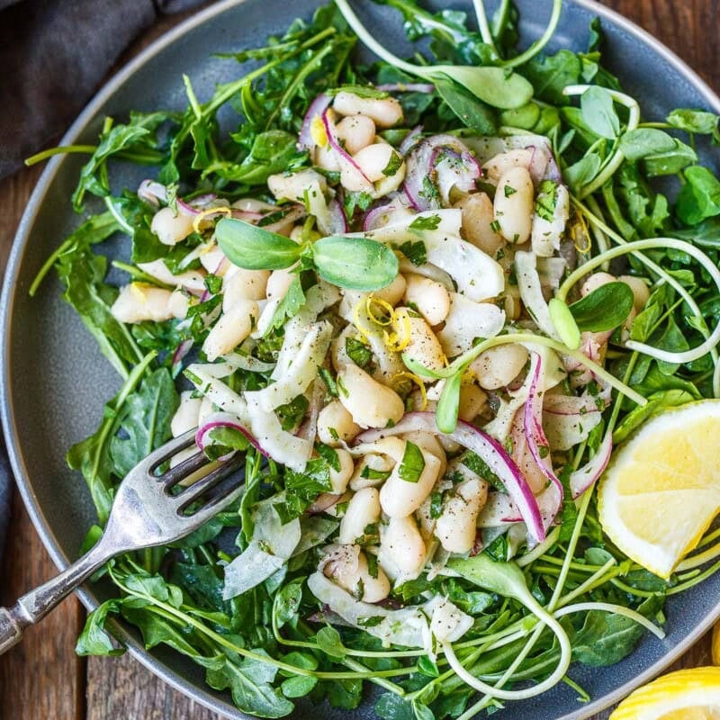This simple white bean salad is easy to throw together, perfect for potlucks and gatherings or a quick, healthy meal! Vegan and gluten-free.