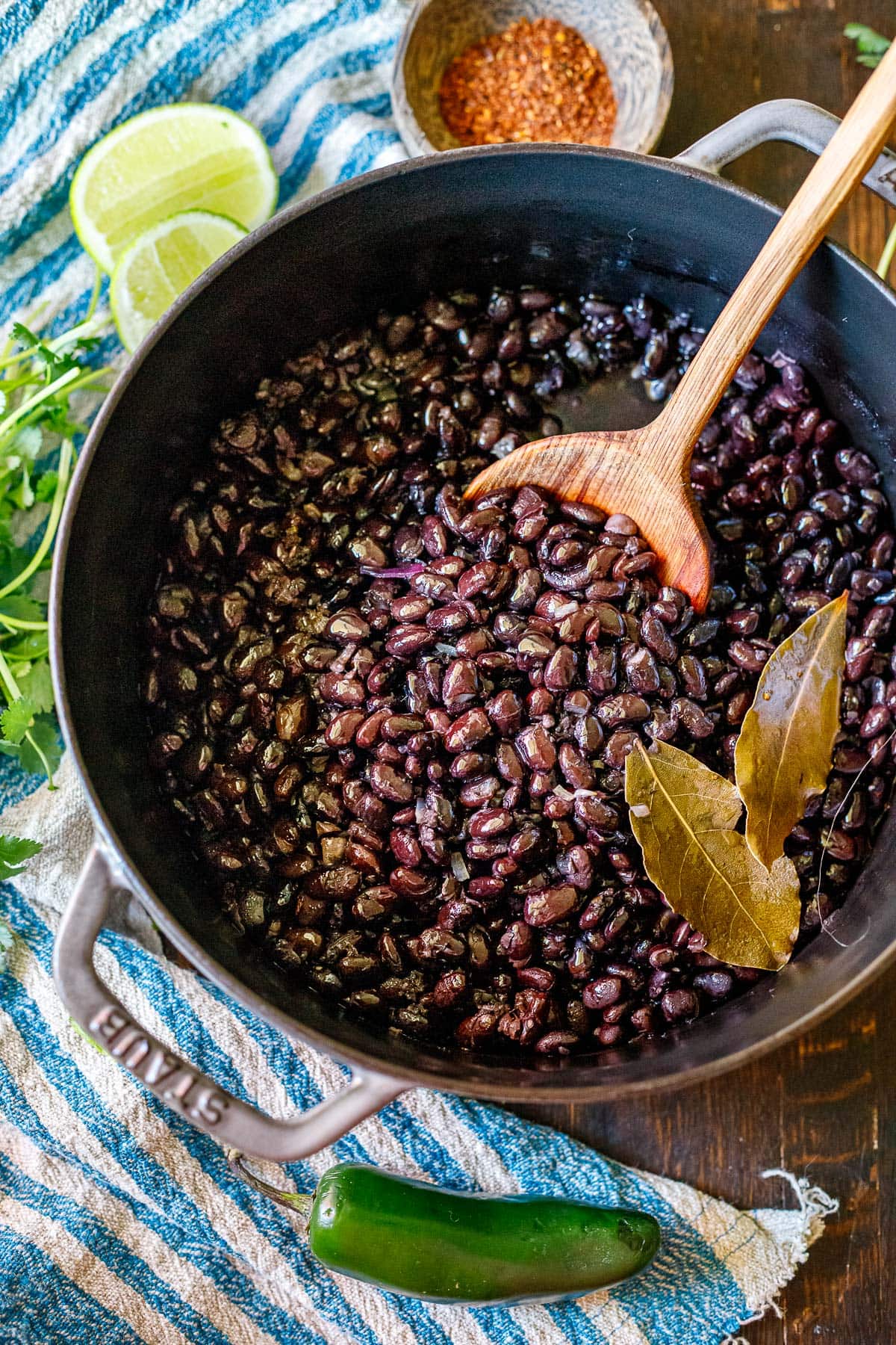 Learn how to cook dry black beans from scratch. This black beans recipe is easy to make and full of flavor, resulting in a creamy interior while holding its structure and shape. A healthy side dish or perfect to use in salads, Buddha bowls, enchiladas, tacos, soups, and more!