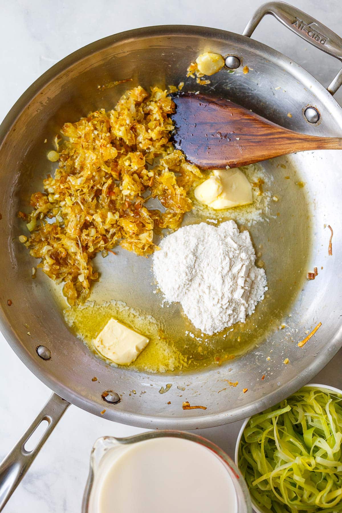 pan with caramelized leeks, butter, and flour.
