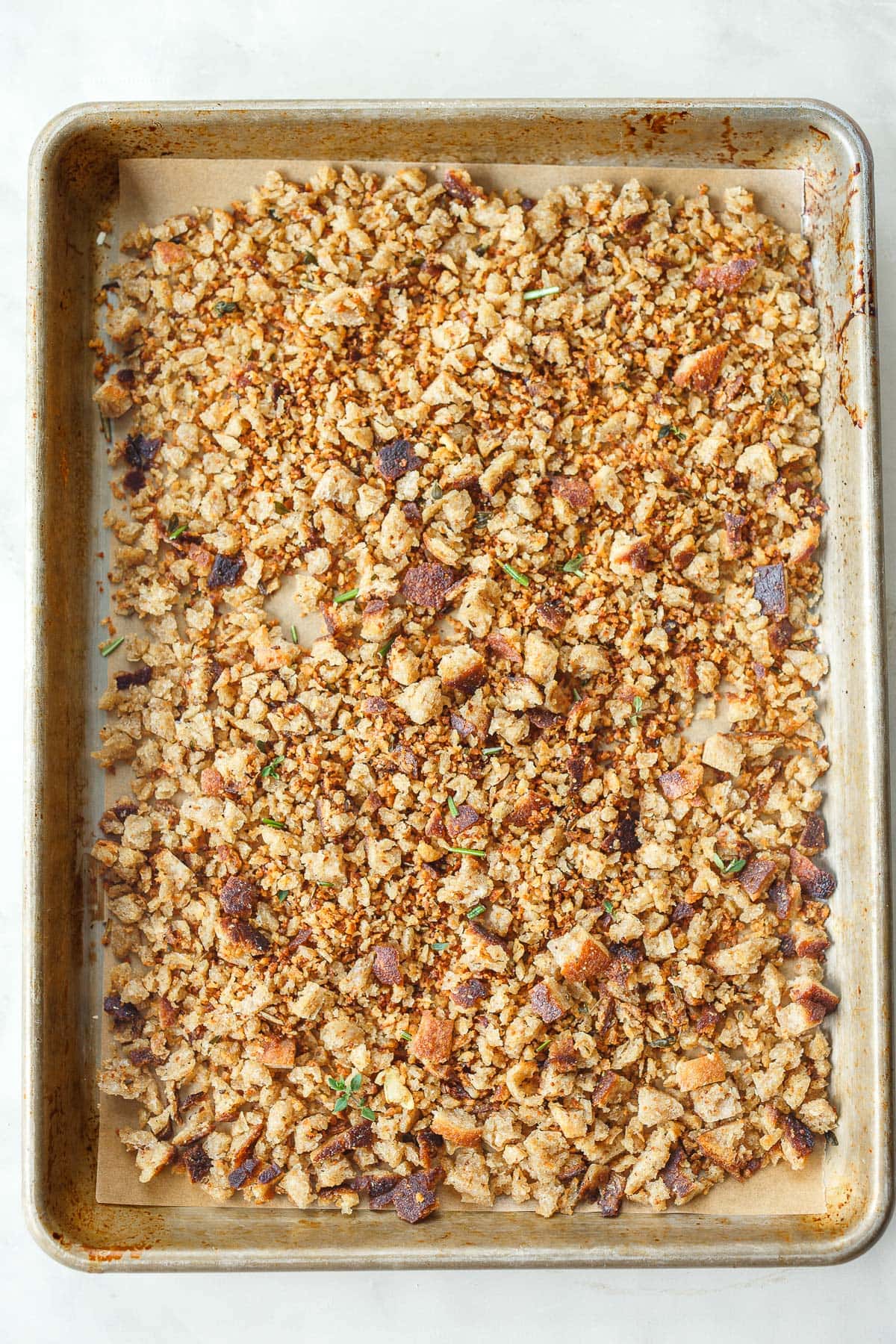 baking sheet with toasted pangrattato spread out.