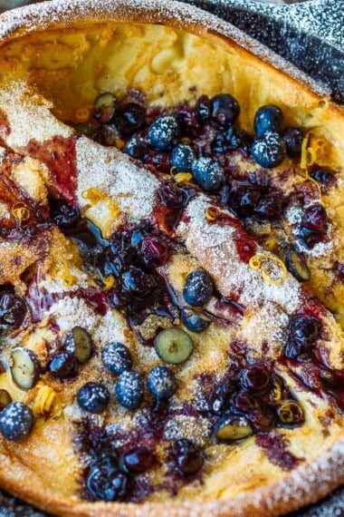Delicious and impressive Blueberry Dutch Baby is made with everyday pantry ingredients and requires only about 10 minutes of hands-on time! Top with maple-sweetened blueberry sauce for a perfect brunch or dessert.