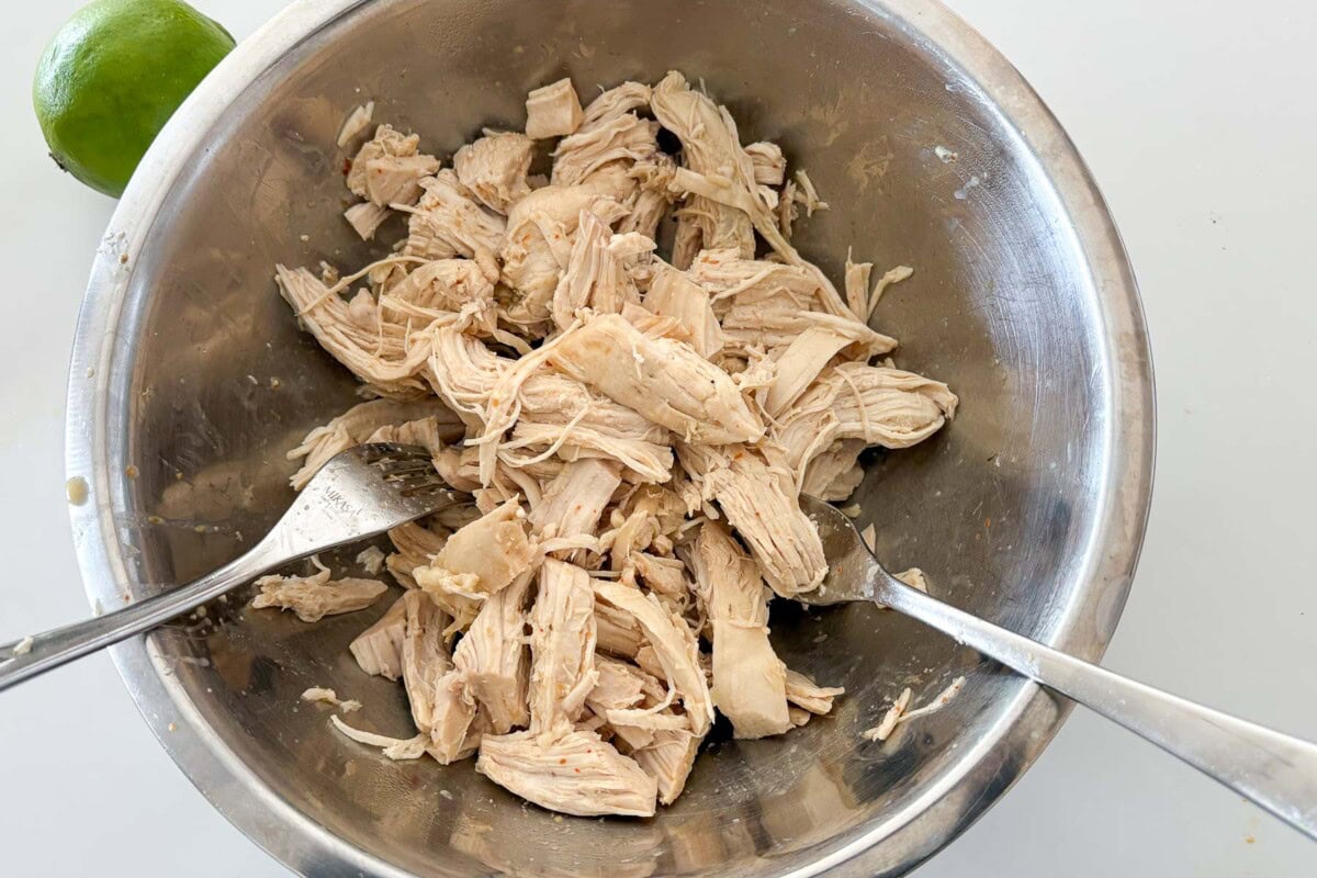 shredding the chicken.