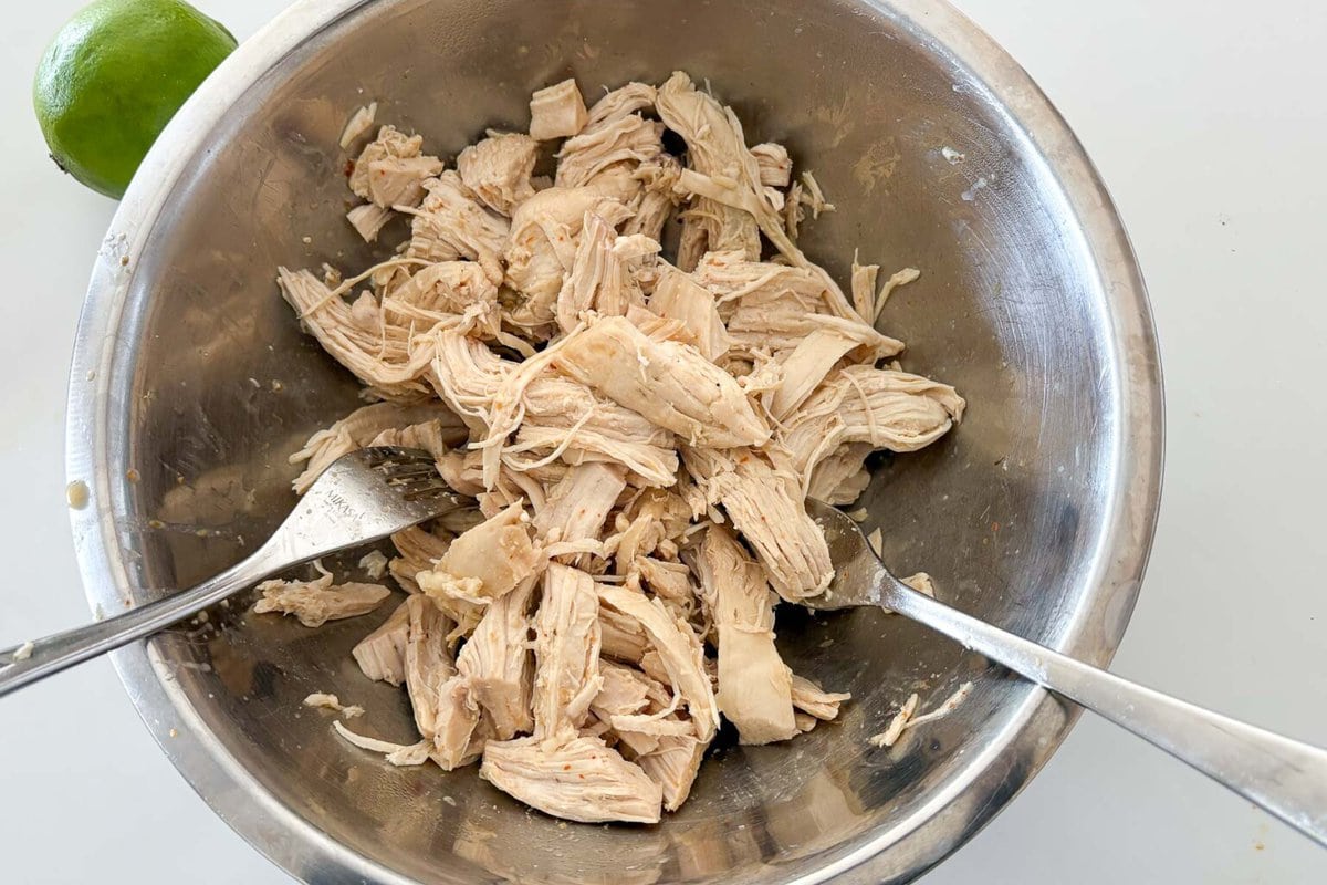 shredding the chicken.