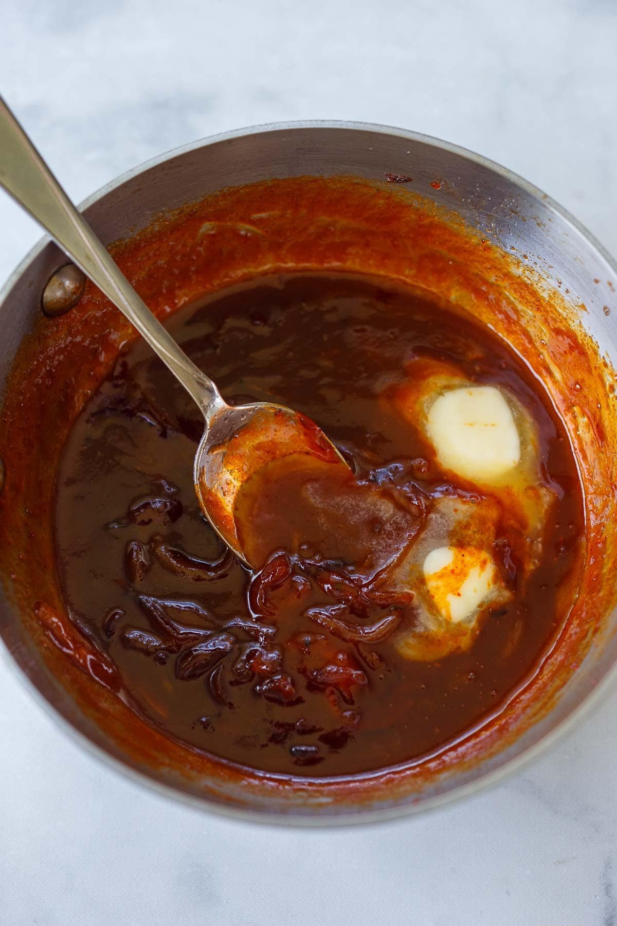 Sticky sauce in a sauce pan.