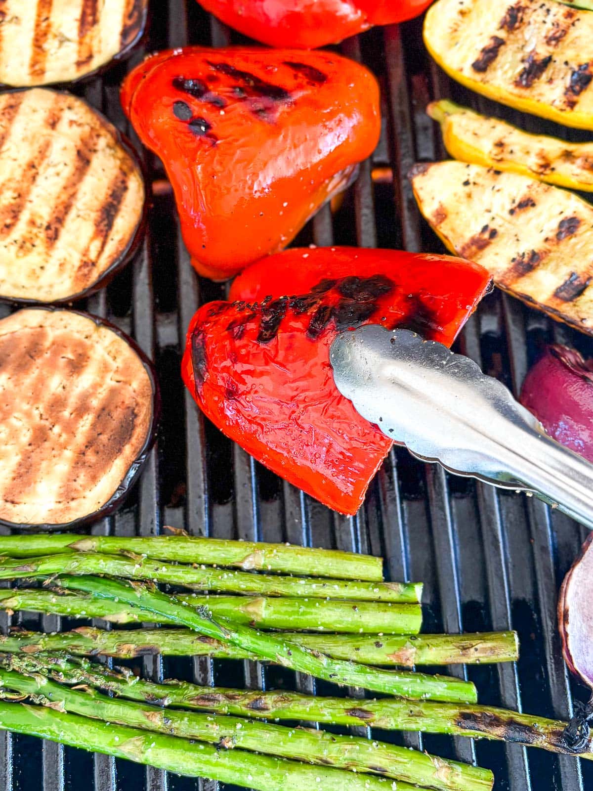 Grouping and grilling the veggies on a med-high heat grill.