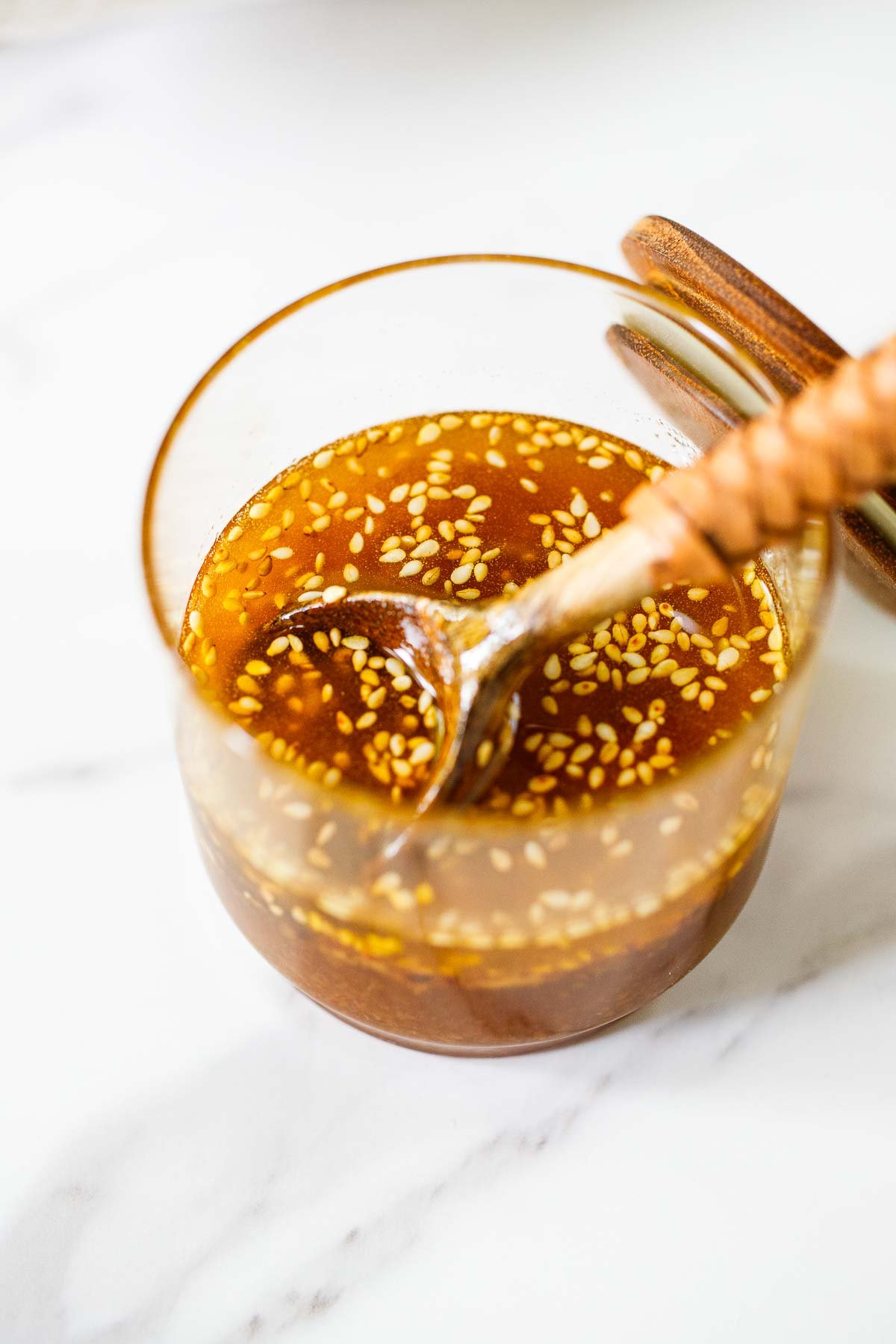 Tangy, sweet, and flavorful, this sesame ginger dressing is delicious on slaws and salads. Easy to make with simple pantry ingredients, it's healthy, vegan and gluten-free!