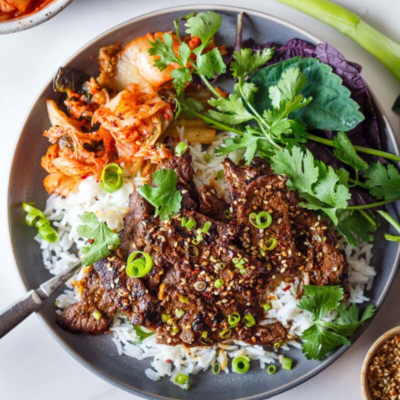 Learn our method to making the best Korean beef bulgogi! Succulent slices of marbled beef are marinated until tender, then pan-seared, resulting in mouth-wateringly tender meat with caramelized edges, and bold flavor.