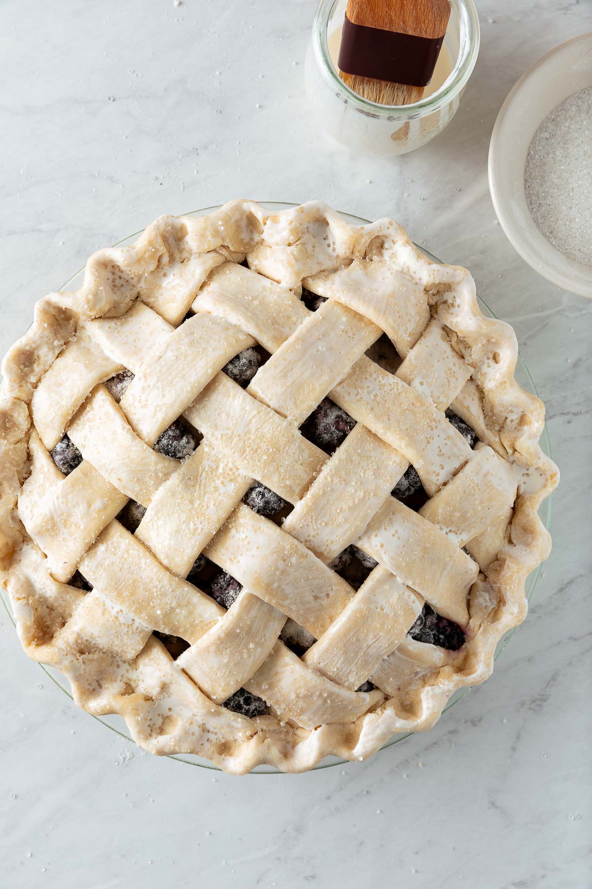 unbaked blackberry pie with lattice top.
