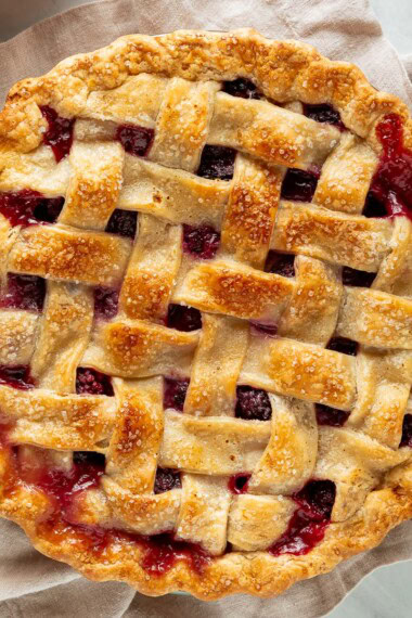 This homemade blackberry pie is bursting with juicy, sweet-tart blackberries and baked in a flaky, golden pie crust. Serve with vanilla ice cream for the ultimate summer dessert.