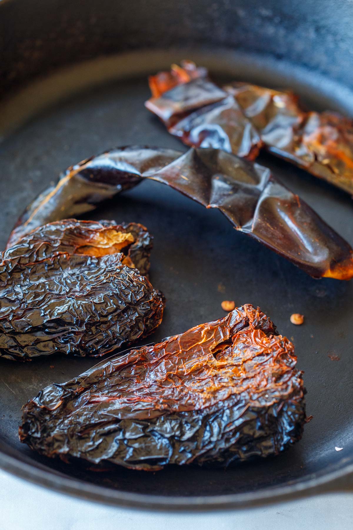 dried chilis toasting on dry skillet.