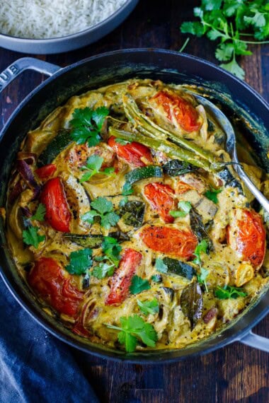 This Indian vegetable curry features end-of-summer vegetables in a fragrant, spice-infused coconut-tamarind curry sauce. Perfect for using up your garden veggies!