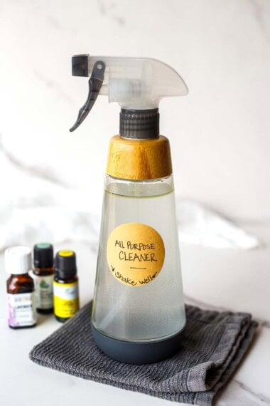 How to make your own natural, disinfecting, all-purpose cleaning spray in 5 minutes, using just three ingredients- distilled vinegar, water, and essential oil.