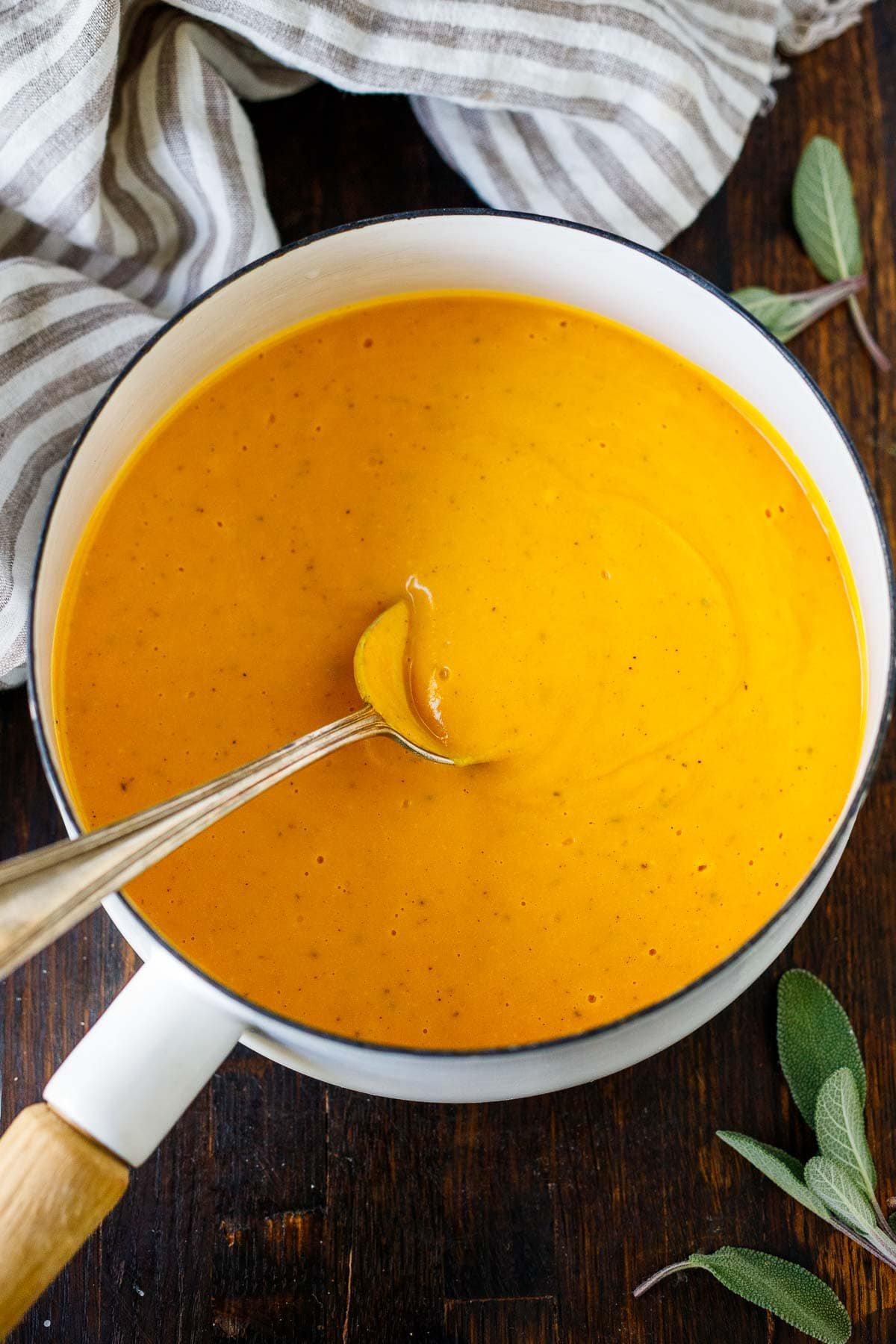 Vegan butternut pasta sauce in a sauce pan.