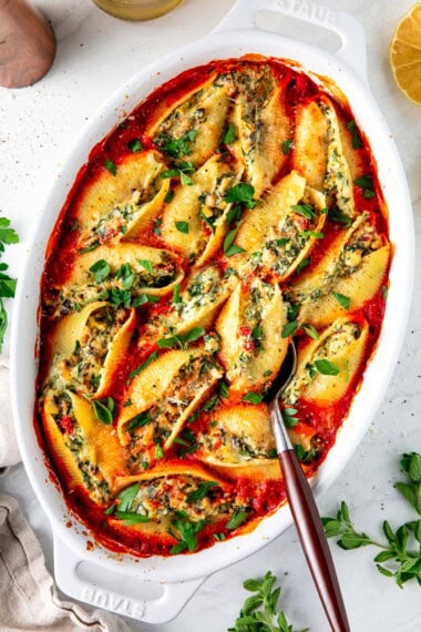 Cozy, satisfying, and bursting with Mediterranean flavor, these Stuffed Shells are filled with ricotta, mushrooms, spinach, and fresh herbs, baked in a rich marinara sauce until bubbly and golden.