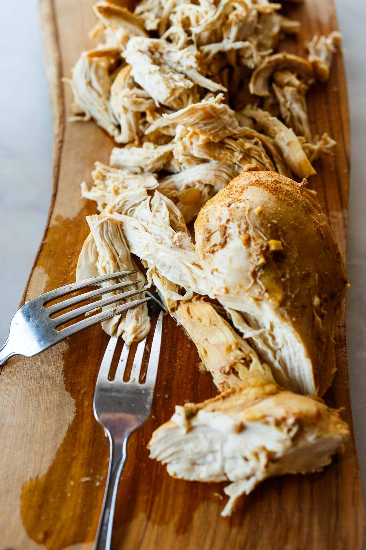 Shredding the chicken.