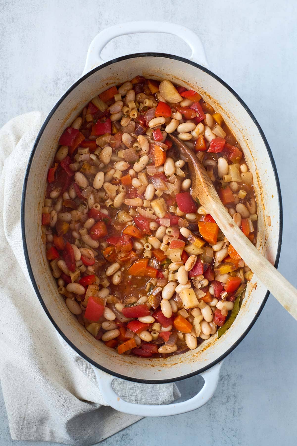 dutch oven with minestrone soup cooking.